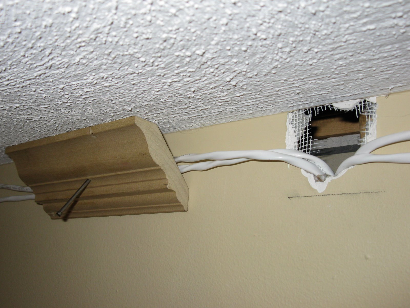 How to hide wall mounted speaker wires in your apartment for under